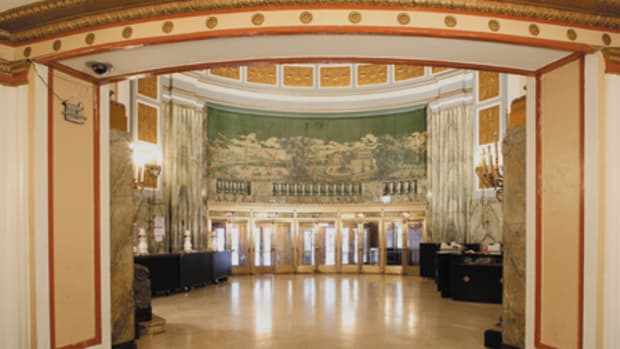 The grand foyer features a custom mural at the west wall above the entry doors. The original – designed by Rambusch Studios – was either removed or never installed. The Classical-style pastoral scene was re-created by New York City-based muralist Mason Nye from a 1930 black-and-white Rambusch advertisement.