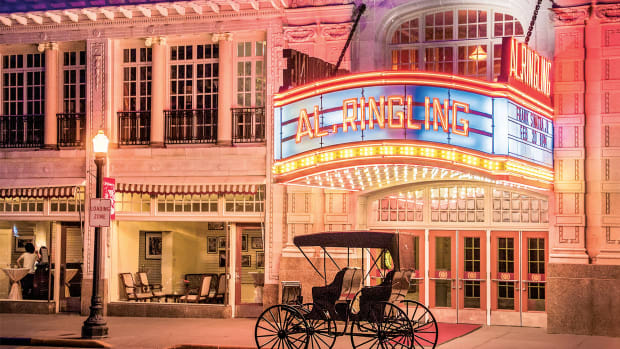 The restored marquee welcomes visitors to the Al. Ringling Theatre. Al. Ringling’s restored private carriage waits out front.