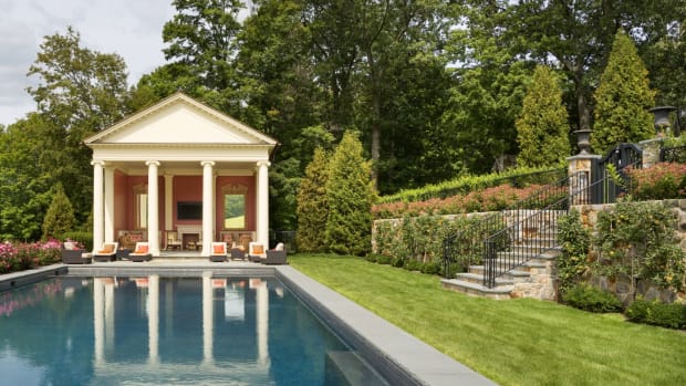 This award-winning pool house, designed by Di Biase Filkoﬀ Architects, features Roman Ionic ﬁberglass columns by Chadsworth. Photo by Durston Saylor