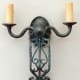 This two-candle sconce is one of many handmade period-style light fixtures offered by Steven Handelman Studios.