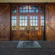 Vintage Homes and Millwork handcrafted custom doors for this project.