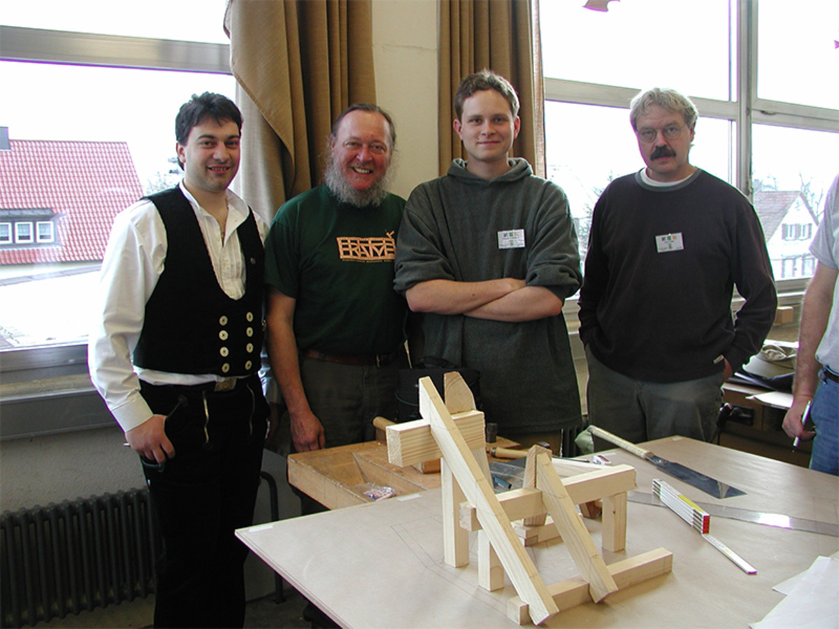 From left to right Filippo Compagnon (Zimmerman Instructor), me, Carson Christian (my son) and Lon Tyler (TFG member and friend) at the compound roof framing class we participated in at the Gewerbe Akademie in Rotweil, Germany, in 2003. Hands-on learning German style!