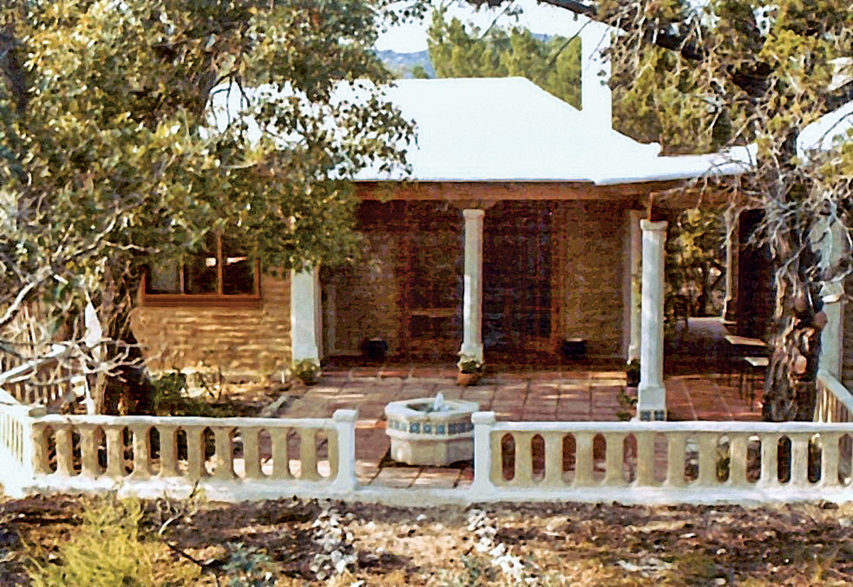 Mehaffy designed and built this small affordable home using recycled materials and stackable masonry units, called wet bricks, with recycled materials and simple decorative pour-in-place forms.