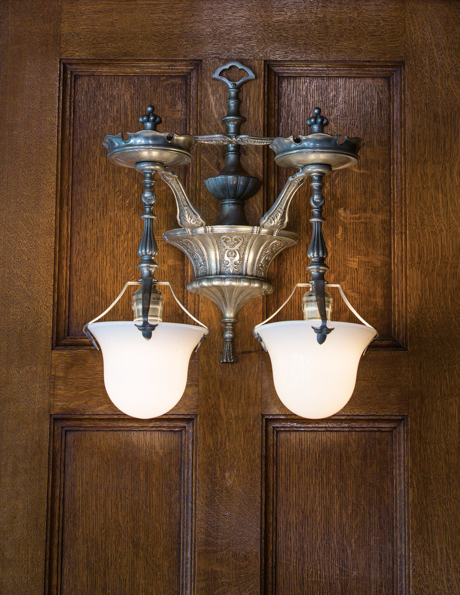replicated library wall sconce