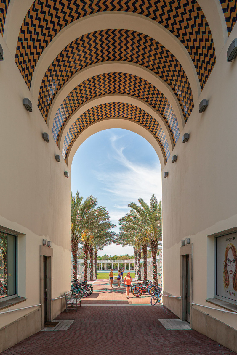 A grand archway leads from the Gateway Building to the Lyceum.
