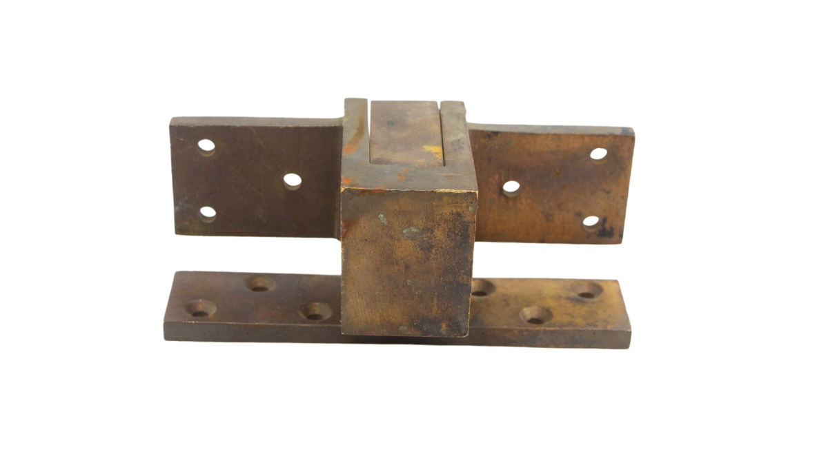 Recessed pocket pivot hinge developed by the W. C. Vaughan Co. of Boston in the 1920s, now known as the Harmon Hinge. This particular hinge was manufactured by the Willamette Hardware Co. and was salvaged from New York City’s Waldorf Astoria Hotel.