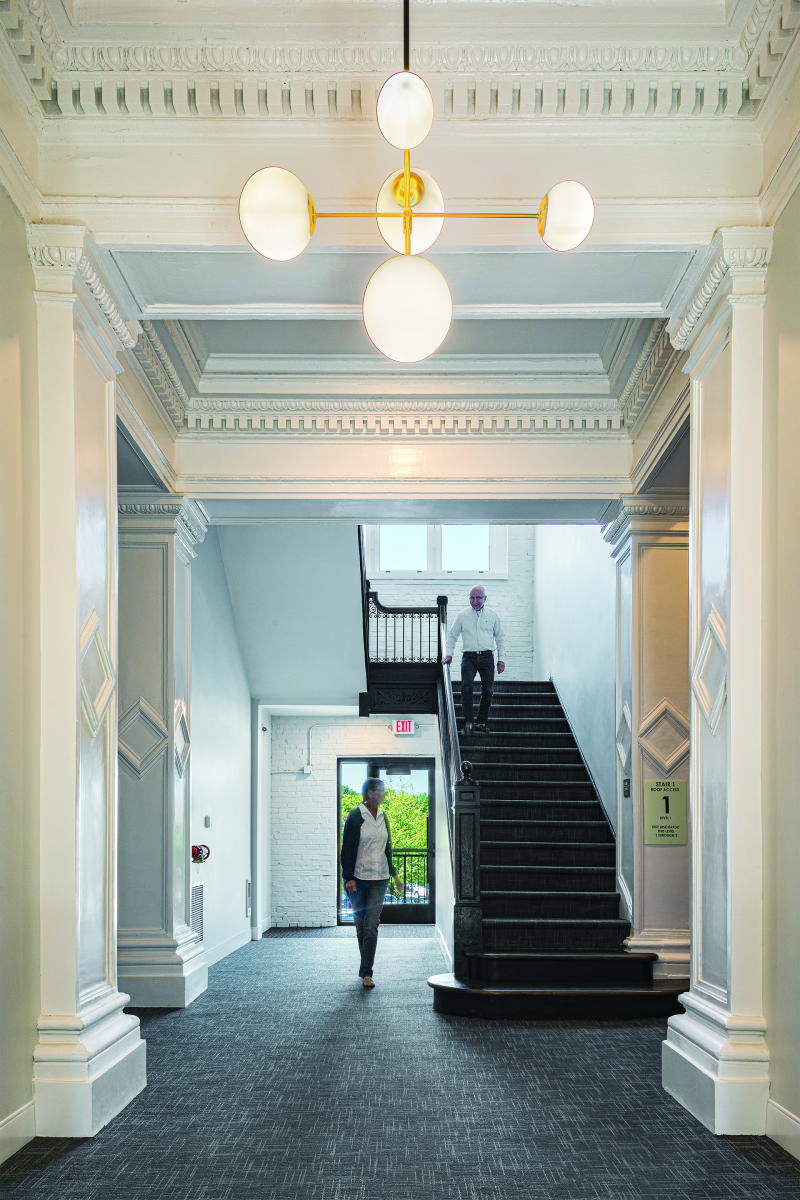The woodwork, plasterwork, marble detailing, and cast-iron staircase inside the Commissioner Building were restored.