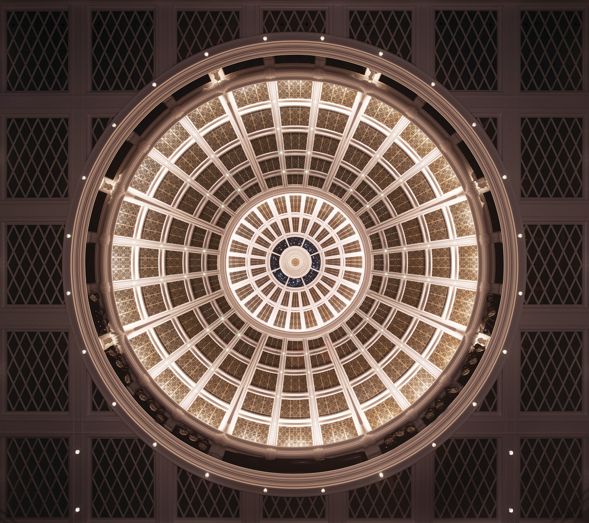 The main hall’s ceiling dome is acoustically transparent to enhance the sound quality of the performing arts center.