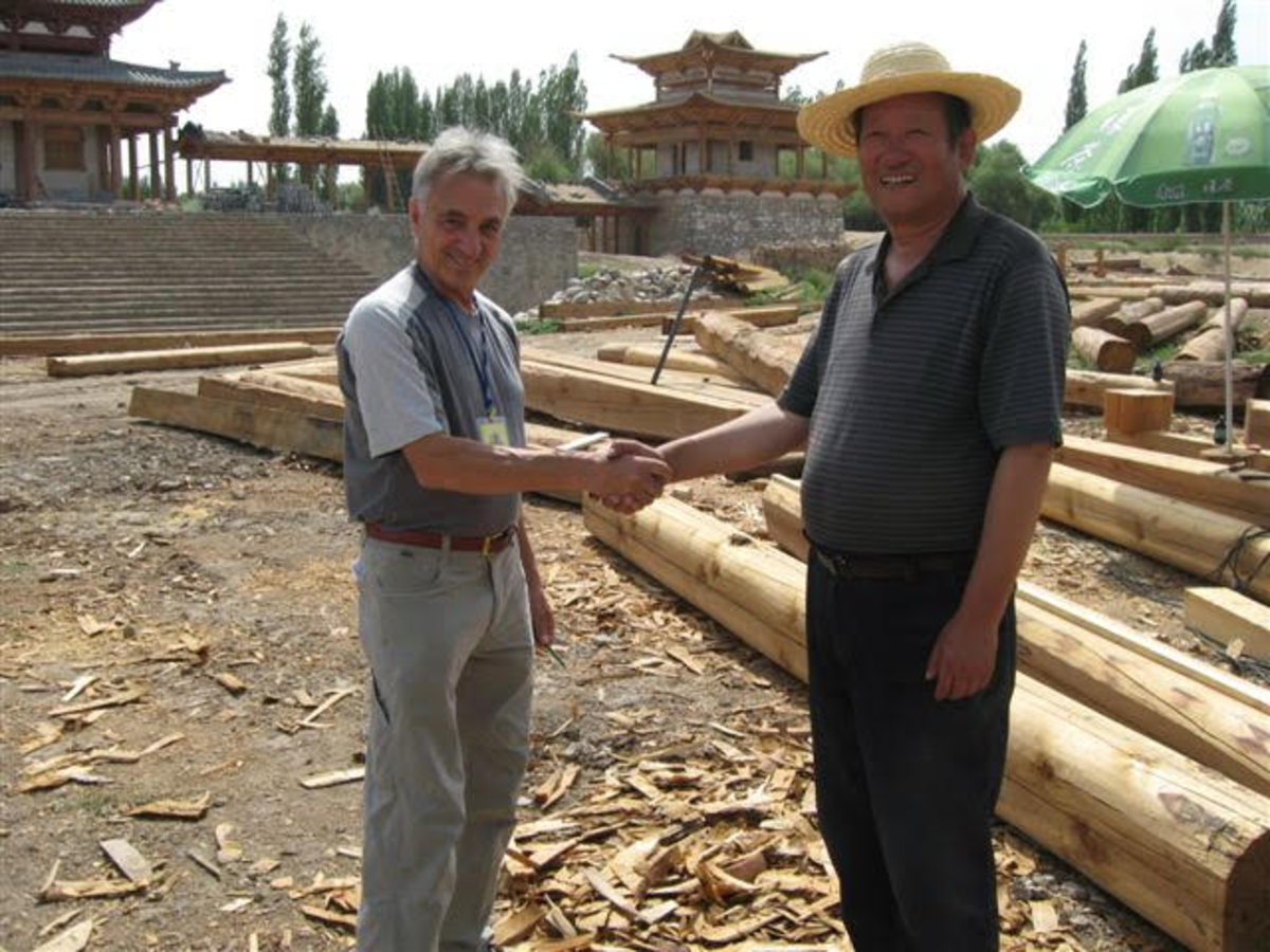 Jan Lewandoski meeting a temple farmer in Gansu, China.