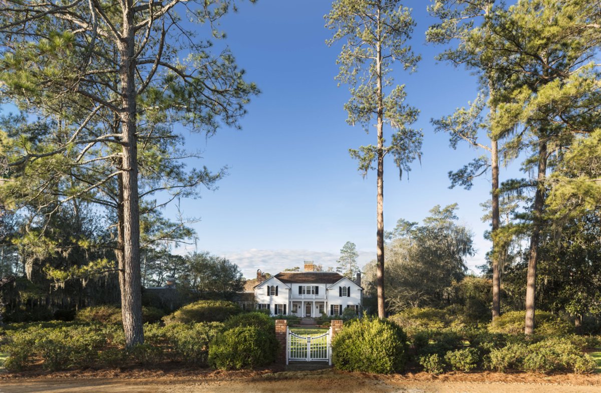 This new-construction traditional-style house in southern Georgia was designed by G.P. Schafer Architect. One of its distinguishing features is the verandah.