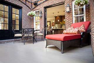 aeratis-kentland-red-chair-porch.jpg