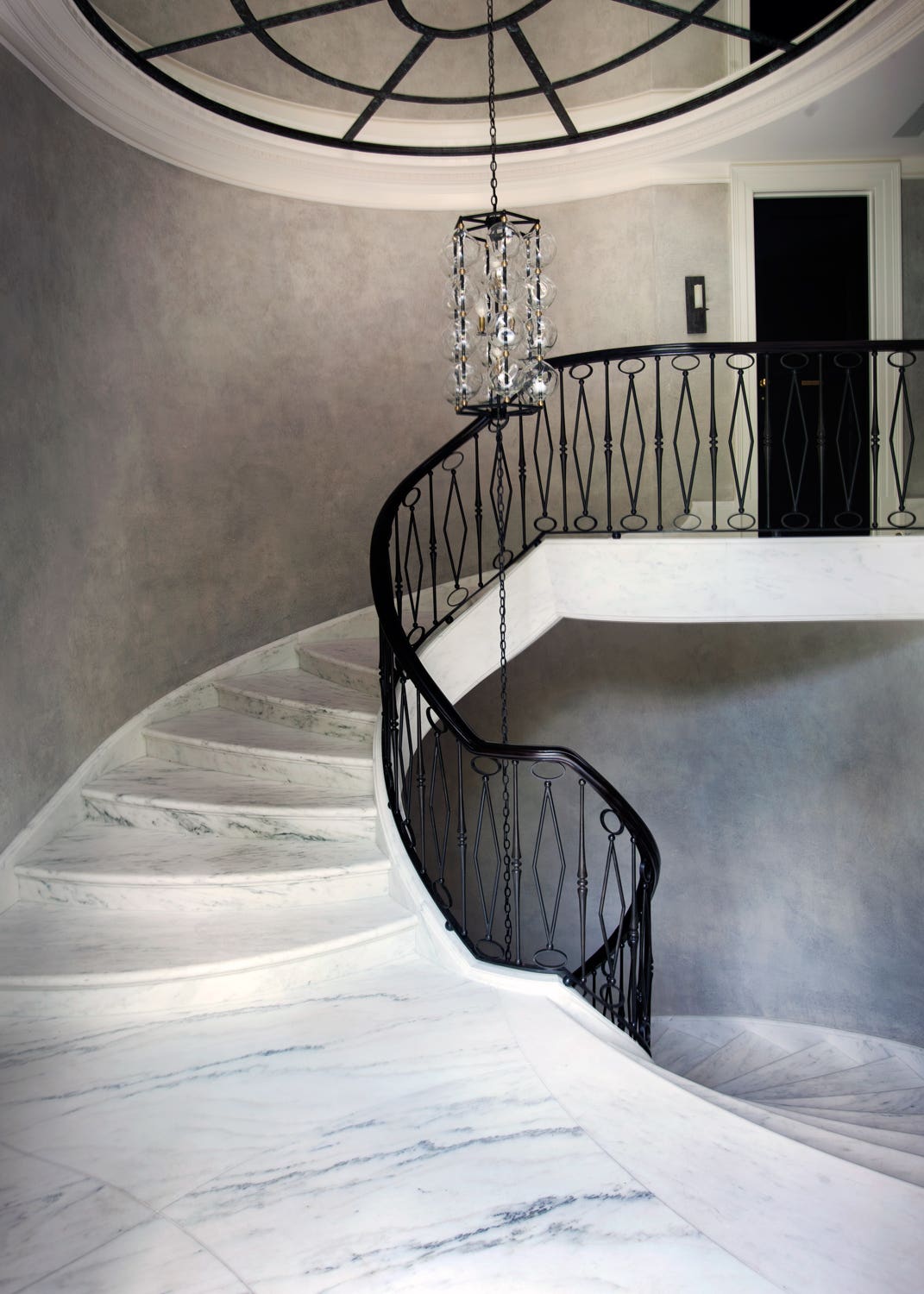 3-staircase_from_living_room_to_middle_level_at_garden_entrance.jpg