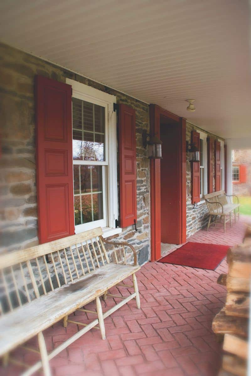 timberlane-red-panel-shutters-stone-1.jpg