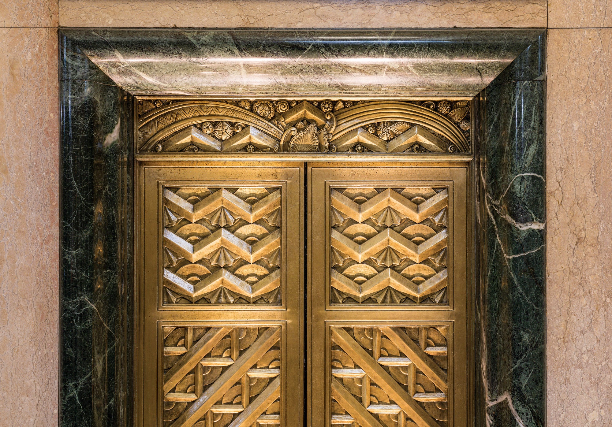 05_trustbldg-bronze-detail-of-1st-flr-elevator_.jpg