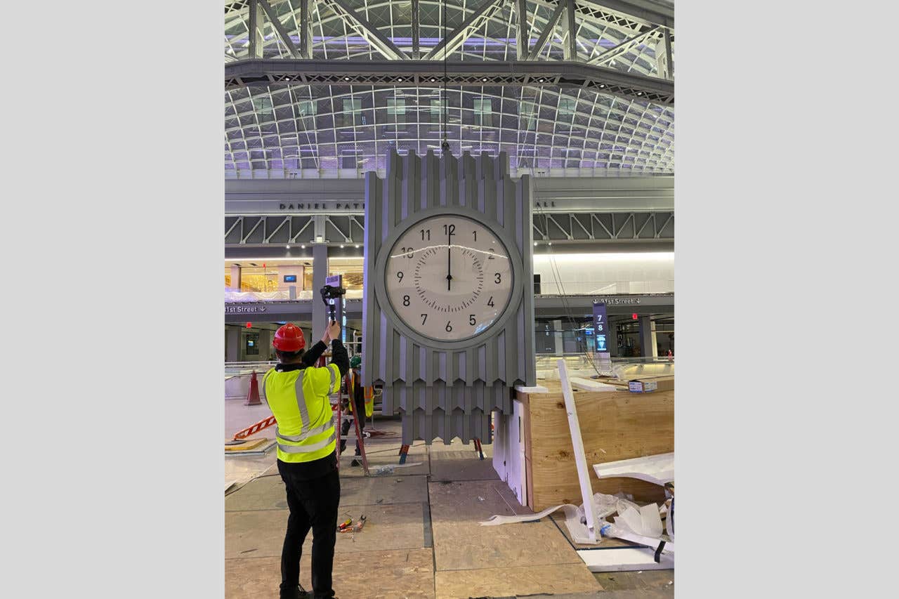resized-peterpennoyerarchitects_mthclock_install.jpg