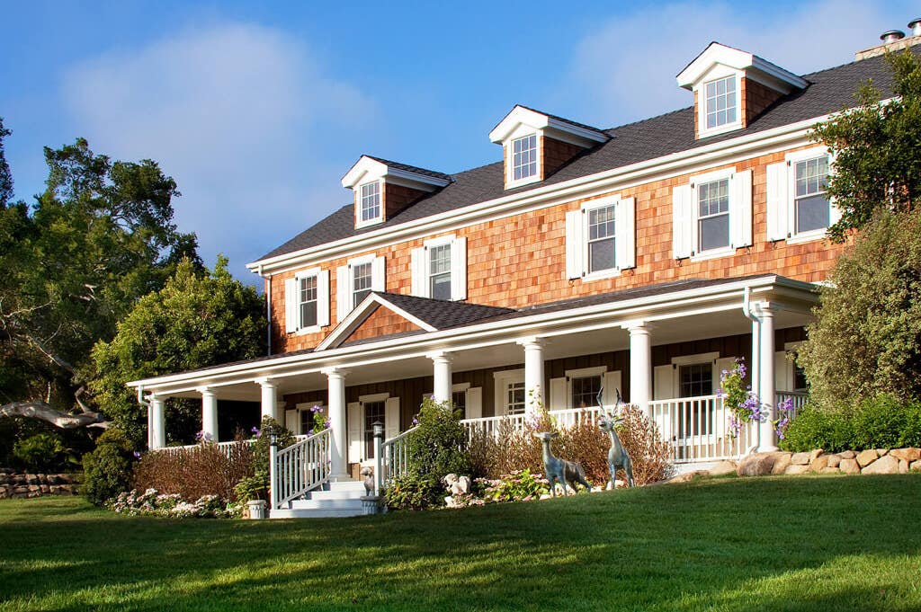 timberlane-gallery-white-panel-louver-shutters-wood-shakes-house.jpg
