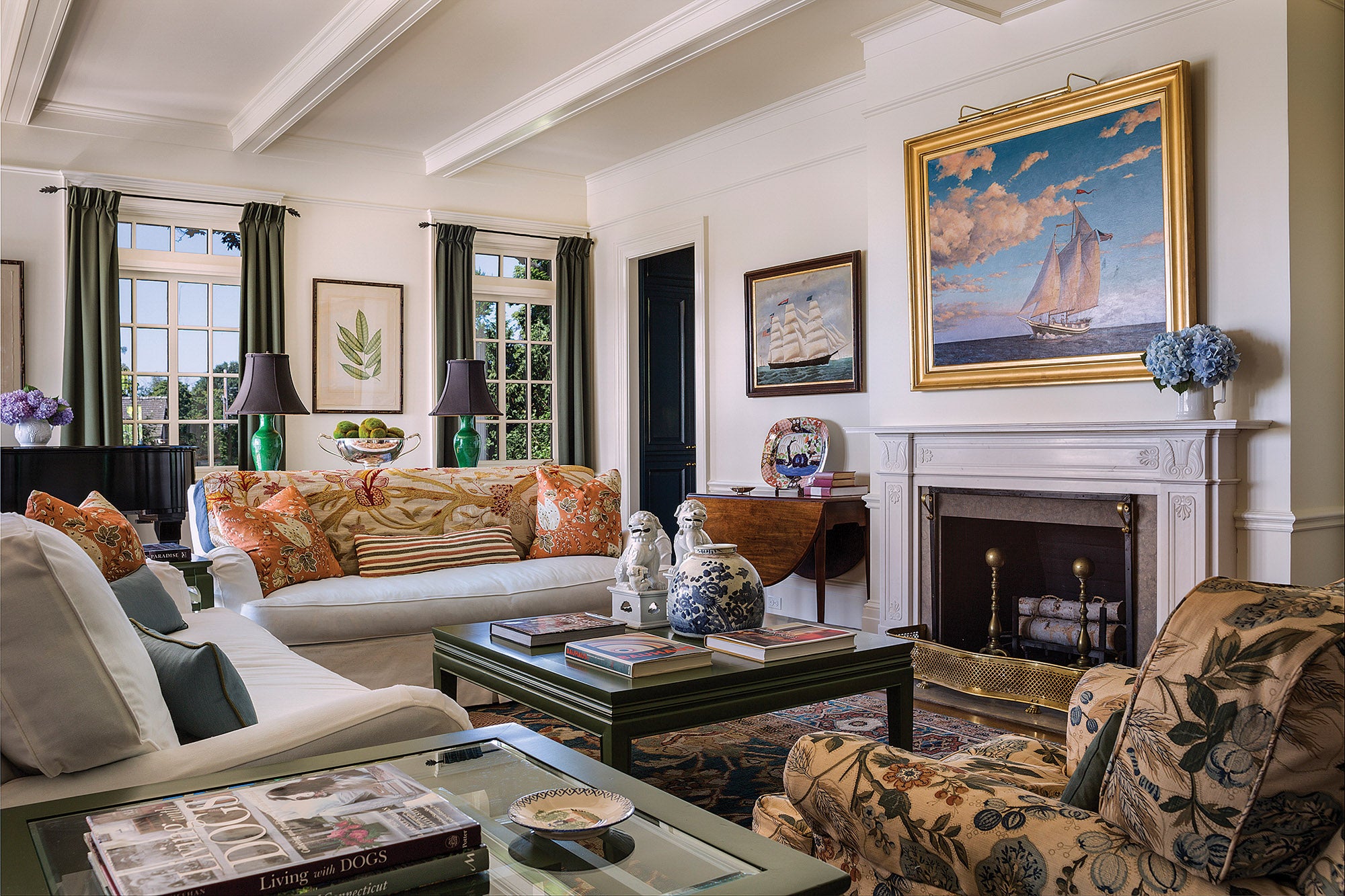05_living_room_with_new_beamed_ceiling_and_statuary_marble_mantel.jpg