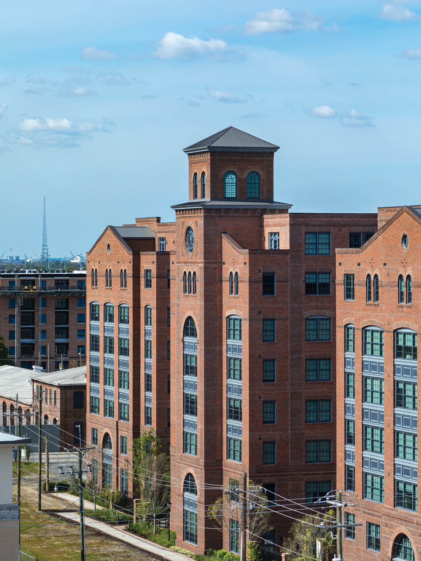 courier-square-phase-1_a-view-of-the-guild-a-new-apartment-building-takes-its-inspiration-from-the-historic-industrial-train-line-it-faces.jpg
