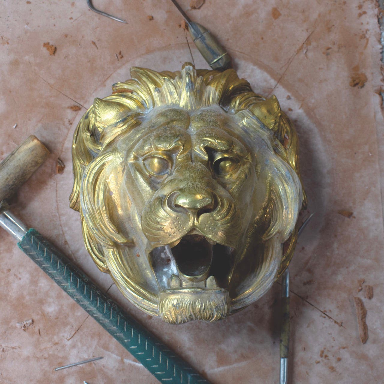 guerin-lion-head-in-foundry_1002-large.jpg